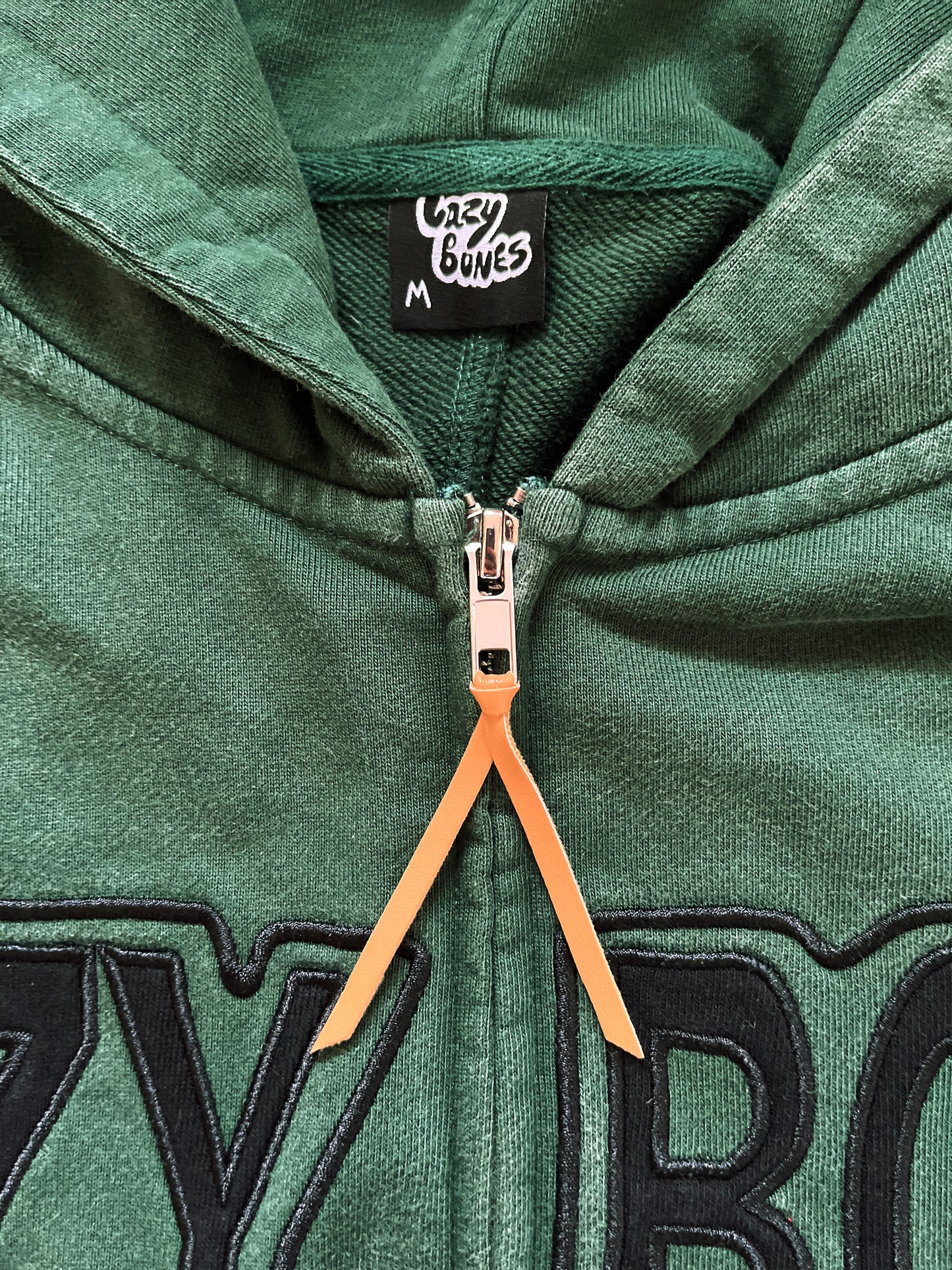 warped logo zip-up